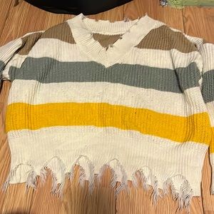 It’s a 1XL it’ from shein it’s brown white gray and yellow